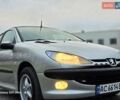 Серый Пежо 206, объемом двигателя 1.4 л и пробегом 221 тыс. км за 2450 $, фото 30 на Automoto.ua