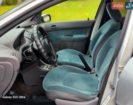 Серый Пежо 206, объемом двигателя 1.4 л и пробегом 221 тыс. км за 2450 $, фото 39 на Automoto.ua