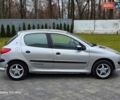 Серый Пежо 206, объемом двигателя 1.4 л и пробегом 221 тыс. км за 2450 $, фото 7 на Automoto.ua
