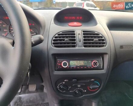 Серый Пежо 206, объемом двигателя 1.12 л и пробегом 154 тыс. км за 2900 $, фото 13 на Automoto.ua