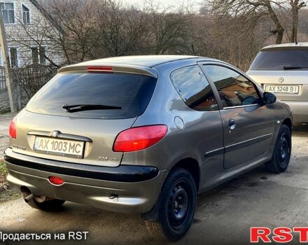 Сірий Пежо 206, об'ємом двигуна 1.4 л та пробігом 345 тис. км за 3400 $, фото 1 на Automoto.ua