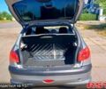 Серый Пежо 206, объемом двигателя 1.4 л и пробегом 150 тыс. км за 4800 $, фото 4 на Automoto.ua