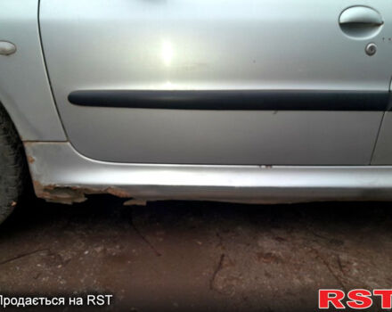 Серый Пежо 206, объемом двигателя 1.9 л и пробегом 308 тыс. км за 2500 $, фото 2 на Automoto.ua