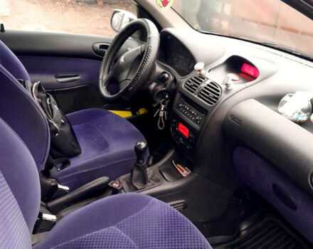 Серый Пежо 206, объемом двигателя 1.9 л и пробегом 308 тыс. км за 2500 $, фото 8 на Automoto.ua