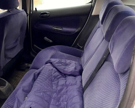 Серый Пежо 206, объемом двигателя 1.9 л и пробегом 308 тыс. км за 2500 $, фото 11 на Automoto.ua