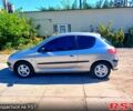 Серый Пежо 206, объемом двигателя 1.4 л и пробегом 150 тыс. км за 4800 $, фото 1 на Automoto.ua