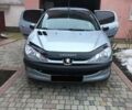 Сірий Пежо 206, об'ємом двигуна 1.4 л та пробігом 209 тис. км за 3200 $, фото 1 на Automoto.ua