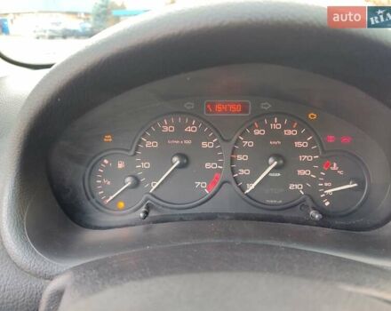 Серый Пежо 206, объемом двигателя 1.12 л и пробегом 154 тыс. км за 2900 $, фото 12 на Automoto.ua