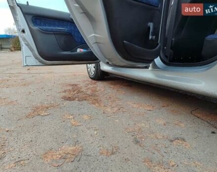 Серый Пежо 206, объемом двигателя 1.12 л и пробегом 154 тыс. км за 2900 $, фото 6 на Automoto.ua