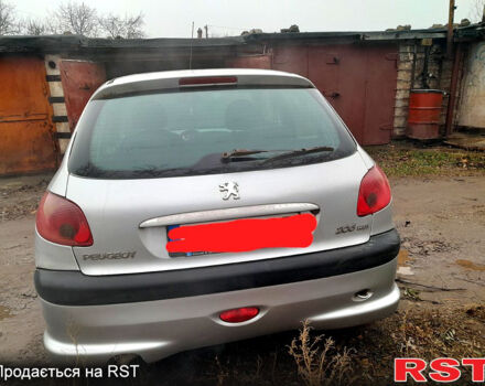 Серый Пежо 206, объемом двигателя 1.9 л и пробегом 308 тыс. км за 2500 $, фото 3 на Automoto.ua