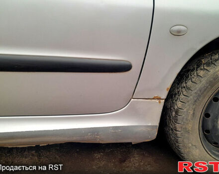 Серый Пежо 206, объемом двигателя 1.9 л и пробегом 308 тыс. км за 2500 $, фото 7 на Automoto.ua