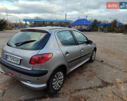 Серый Пежо 206, объемом двигателя 1.12 л и пробегом 154 тыс. км за 2900 $, фото 2 на Automoto.ua