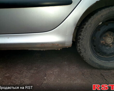 Серый Пежо 206, объемом двигателя 1.9 л и пробегом 308 тыс. км за 2500 $, фото 4 на Automoto.ua