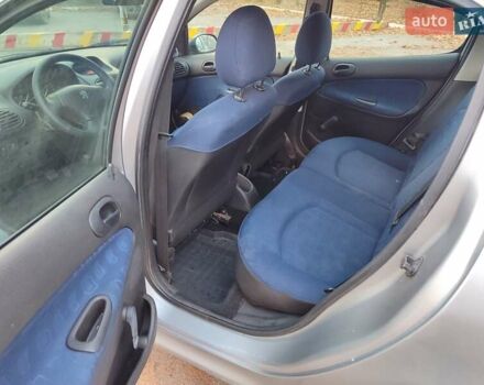 Серый Пежо 206, объемом двигателя 1.12 л и пробегом 154 тыс. км за 2900 $, фото 7 на Automoto.ua