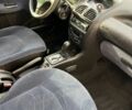Серый Пежо 206, объемом двигателя 1.4 л и пробегом 130 тыс. км за 3000 $, фото 6 на Automoto.ua