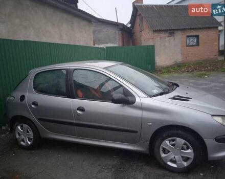 Сірий Пежо 206, об'ємом двигуна 1.4 л та пробігом 300 тис. км за 1999 $, фото 2 на Automoto.ua