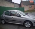 Сірий Пежо 206, об'ємом двигуна 1.4 л та пробігом 300 тис. км за 1999 $, фото 2 на Automoto.ua