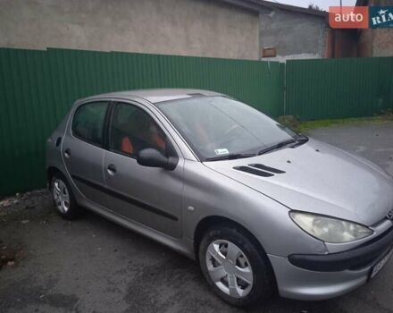 Сірий Пежо 206, об'ємом двигуна 1.4 л та пробігом 300 тис. км за 1999 $, фото 1 на Automoto.ua