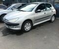 Серый Пежо 206, объемом двигателя 1.4 л и пробегом 255 тыс. км за 3500 $, фото 1 на Automoto.ua