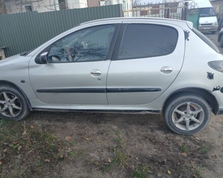 Серый Пежо 206, объемом двигателя 1.4 л и пробегом 186 тыс. км за 2500 $, фото 3 на Automoto.ua