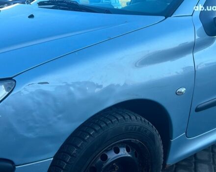 Сірий Пежо 206, об'ємом двигуна 1.2 л та пробігом 211 тис. км за 1300 $, фото 4 на Automoto.ua