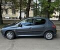 Серый Пежо 206, объемом двигателя 1.4 л и пробегом 230 тыс. км за 2600 $, фото 1 на Automoto.ua