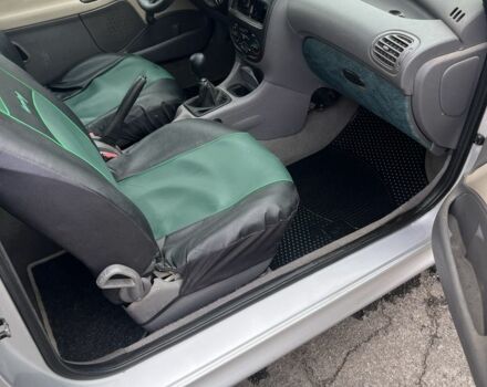 Серый Пежо 206, объемом двигателя 1.4 л и пробегом 230 тыс. км за 650 $, фото 7 на Automoto.ua