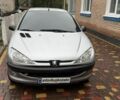 Серый Пежо 206, объемом двигателя 1.4 л и пробегом 250 тыс. км за 2451 $, фото 1 на Automoto.ua