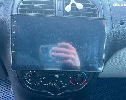 Сірий Пежо 206, об'ємом двигуна 1.2 л та пробігом 211 тис. км за 1300 $, фото 17 на Automoto.ua