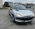 Серый Пежо 206, объемом двигателя 1.4 л и пробегом 230 тыс. км за 650 $, фото 1 на Automoto.ua