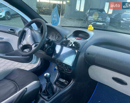 Сірий Пежо 206, об'ємом двигуна 1.2 л та пробігом 211 тис. км за 1300 $, фото 30 на Automoto.ua