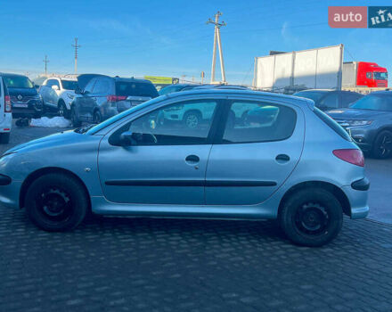 Сірий Пежо 206, об'ємом двигуна 1.2 л та пробігом 211 тис. км за 1300 $, фото 5 на Automoto.ua