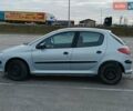 Серый Пежо 206, объемом двигателя 1.12 л и пробегом 211 тыс. км за 2200 $, фото 4 на Automoto.ua