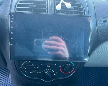 Сірий Пежо 206, об'ємом двигуна 1.2 л та пробігом 211 тис. км за 2300 $, фото 17 на Automoto.ua