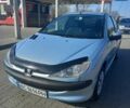 Серый Пежо 206, объемом двигателя 1.4 л и пробегом 170 тыс. км за 3000 $, фото 1 на Automoto.ua