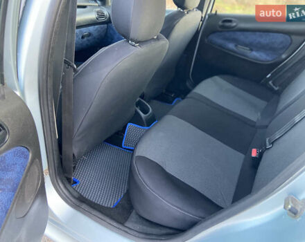 Серый Пежо 206, объемом двигателя 1.36 л и пробегом 173 тыс. км за 3350 $, фото 7 на Automoto.ua