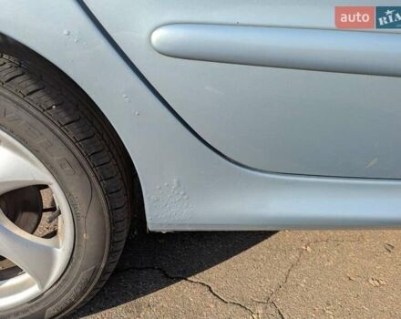 Сірий Пежо 206, об'ємом двигуна 1.59 л та пробігом 246 тис. км за 4100 $, фото 9 на Automoto.ua