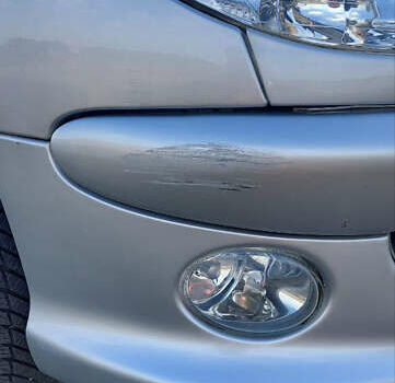 Серый Пежо 206, объемом двигателя 1.6 л и пробегом 90 тыс. км за 5500 $, фото 1 на Automoto.ua