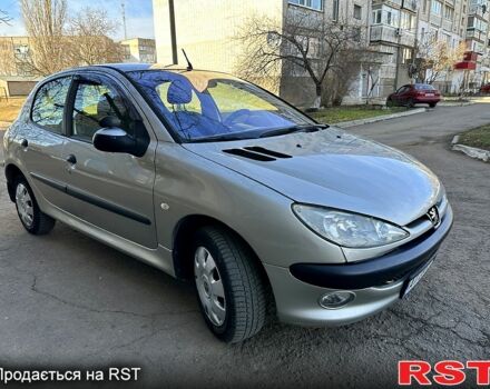 Серый Пежо 206, объемом двигателя 1.4 л и пробегом 165 тыс. км за 3750 $, фото 3 на Automoto.ua