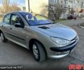 Серый Пежо 206, объемом двигателя 1.4 л и пробегом 165 тыс. км за 3750 $, фото 3 на Automoto.ua