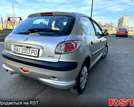 Серый Пежо 206, объемом двигателя 1.4 л и пробегом 165 тыс. км за 3750 $, фото 4 на Automoto.ua