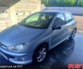 Серый Пежо 206, объемом двигателя 1.6 л и пробегом 251 тыс. км за 4000 $, фото 1 на Automoto.ua