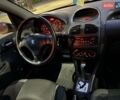 Серый Пежо 206, объемом двигателя 1.4 л и пробегом 167 тыс. км за 2750 $, фото 4 на Automoto.ua