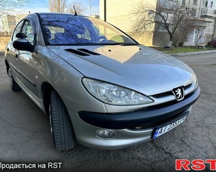 Серый Пежо 206, объемом двигателя 1.4 л и пробегом 165 тыс. км за 3750 $, фото 2 на Automoto.ua
