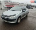 Серый Пежо 206, объемом двигателя 1.36 л и пробегом 173 тыс. км за 3800 $, фото 1 на Automoto.ua
