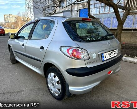 Серый Пежо 206, объемом двигателя 1.4 л и пробегом 165 тыс. км за 3750 $, фото 6 на Automoto.ua