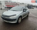 Серый Пежо 206, объемом двигателя 1.36 л и пробегом 173 тыс. км за 3800 $, фото 1 на Automoto.ua