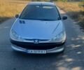 Серый Пежо 206, объемом двигателя 1.4 л и пробегом 200 тыс. км за 3000 $, фото 1 на Automoto.ua