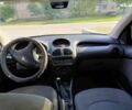 Серый Пежо 206, объемом двигателя 1.4 л и пробегом 200 тыс. км за 3000 $, фото 2 на Automoto.ua