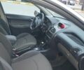 Серый Пежо 206, объемом двигателя 1.4 л и пробегом 260 тыс. км за 3000 $, фото 13 на Automoto.ua